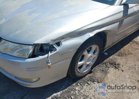 2003 Toyota Camry Solara Sle V6 z USA, uszkodzony, nr VIN 2T1FF22P43C602294